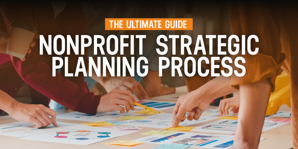 The Ultimate Guide to the Nonprofit Strategic Planning Process

Close up of several people pointing to a set of diagrams